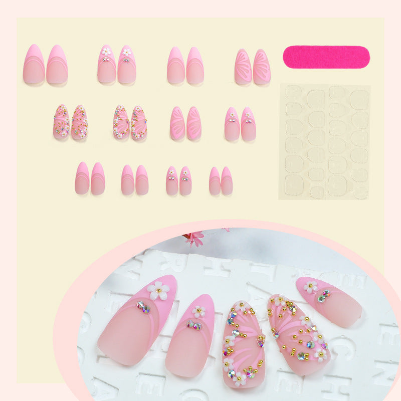 Dekoratives Press-On Nagelkunst-Set mit Schmuckstein- und Blumenakzenten Karnz