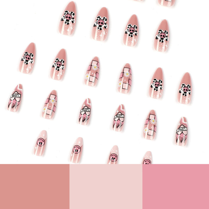 Kunstvolle Nagelverlängerungen mit verspieltem Design und einzigartigen Motiven Karnz
