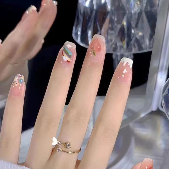Kreative Nagelkunst mit Obst- und Blumenmotiven Karnz