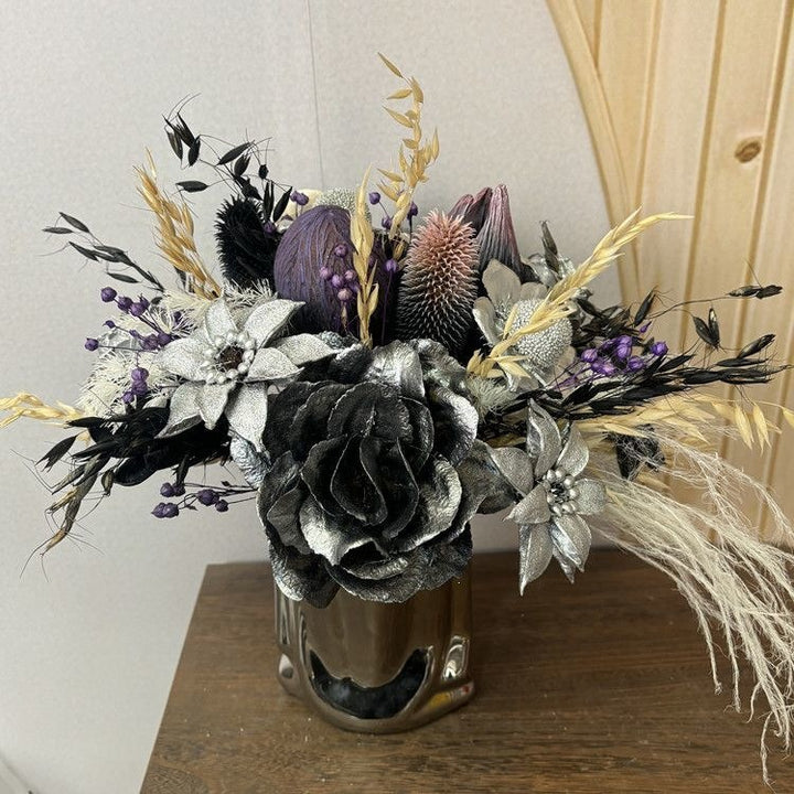 Lebensechte dekorative Blumenmittelstück
