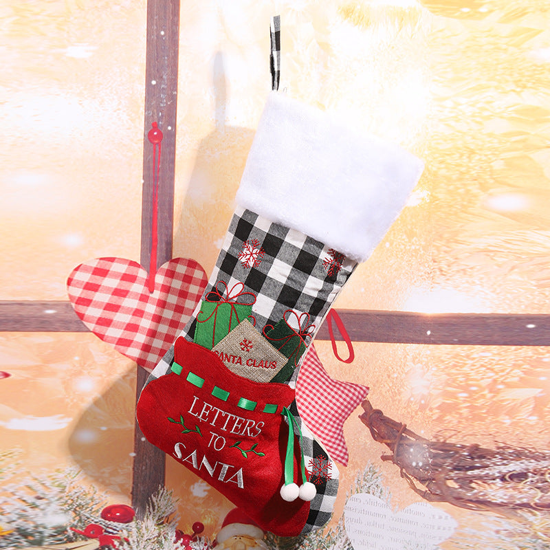 Festlicher Weihnachtsstrumpf mit klassischen Motiven Karnz