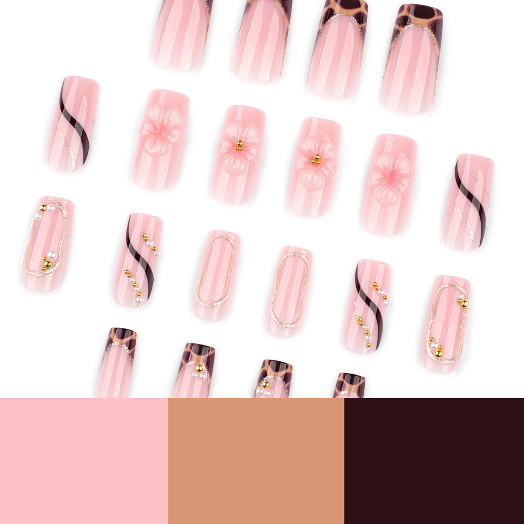 Künstliche Nagelkunst mit Blumen- und Glitzereffekten Karnz