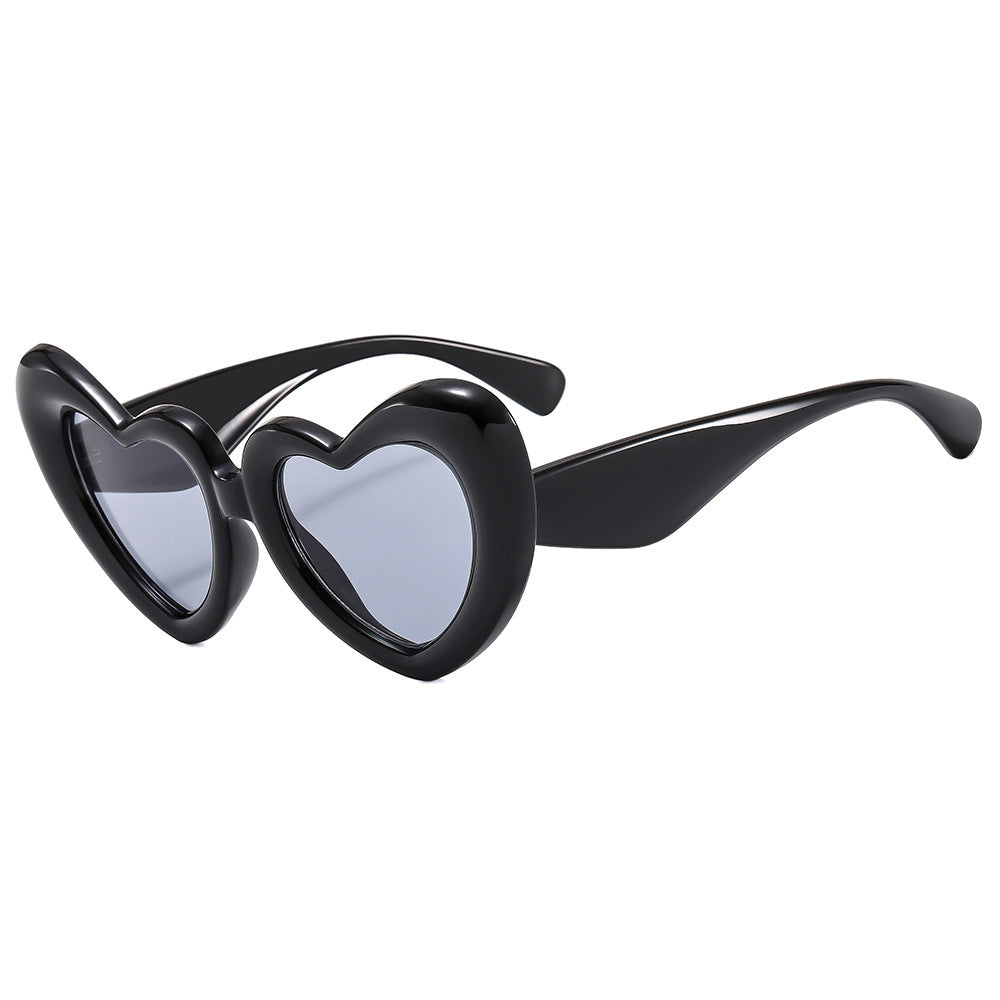 Damen Herzförmige Sonnenbrille mit stylischem Rahmen Karnz