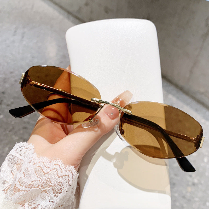 Damen Sonnenbrille im modernen Ovaldesign mit kontrastierendem Rahmen Karnz