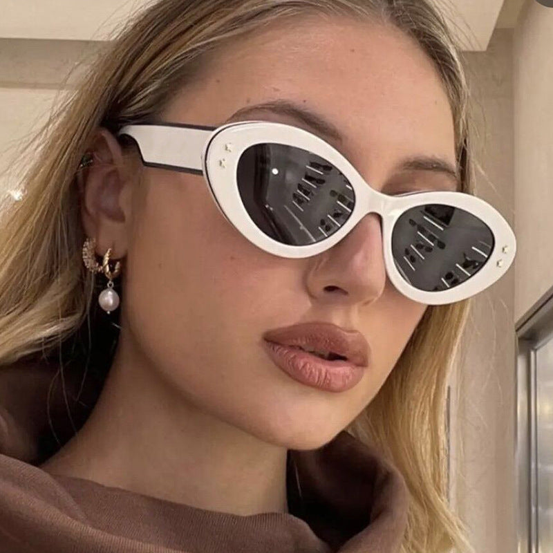 Damen Cat-Eye Sonnenbrille mit luxuriösem Kunststoffrahmen und dekorativen Akzenten Karnz