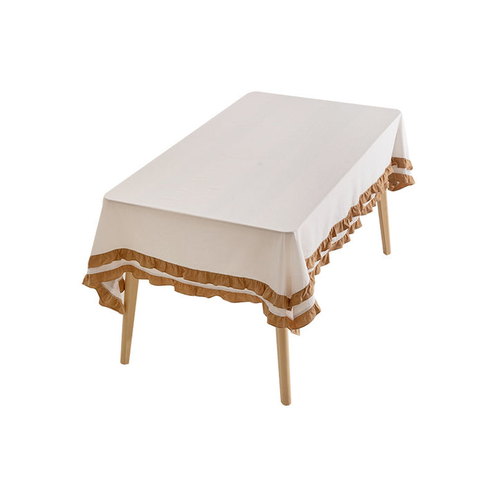 Rundtischdecke mit gestepptem Strukturrelief und zweilagigem Volant Karnz