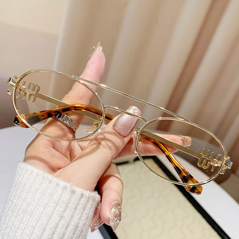 Damen modische Brille mit elegantem Metallrahmen und einzigartigem Design Karnz