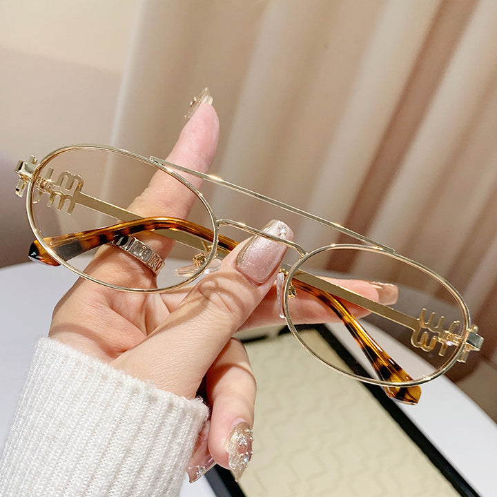 Damen modische Brille mit elegantem Metallrahmen und einzigartigem Design Karnz