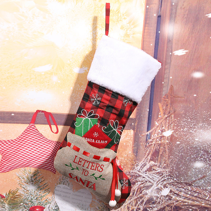 Festlicher Weihnachtsstrumpf mit klassischen Motiven Karnz