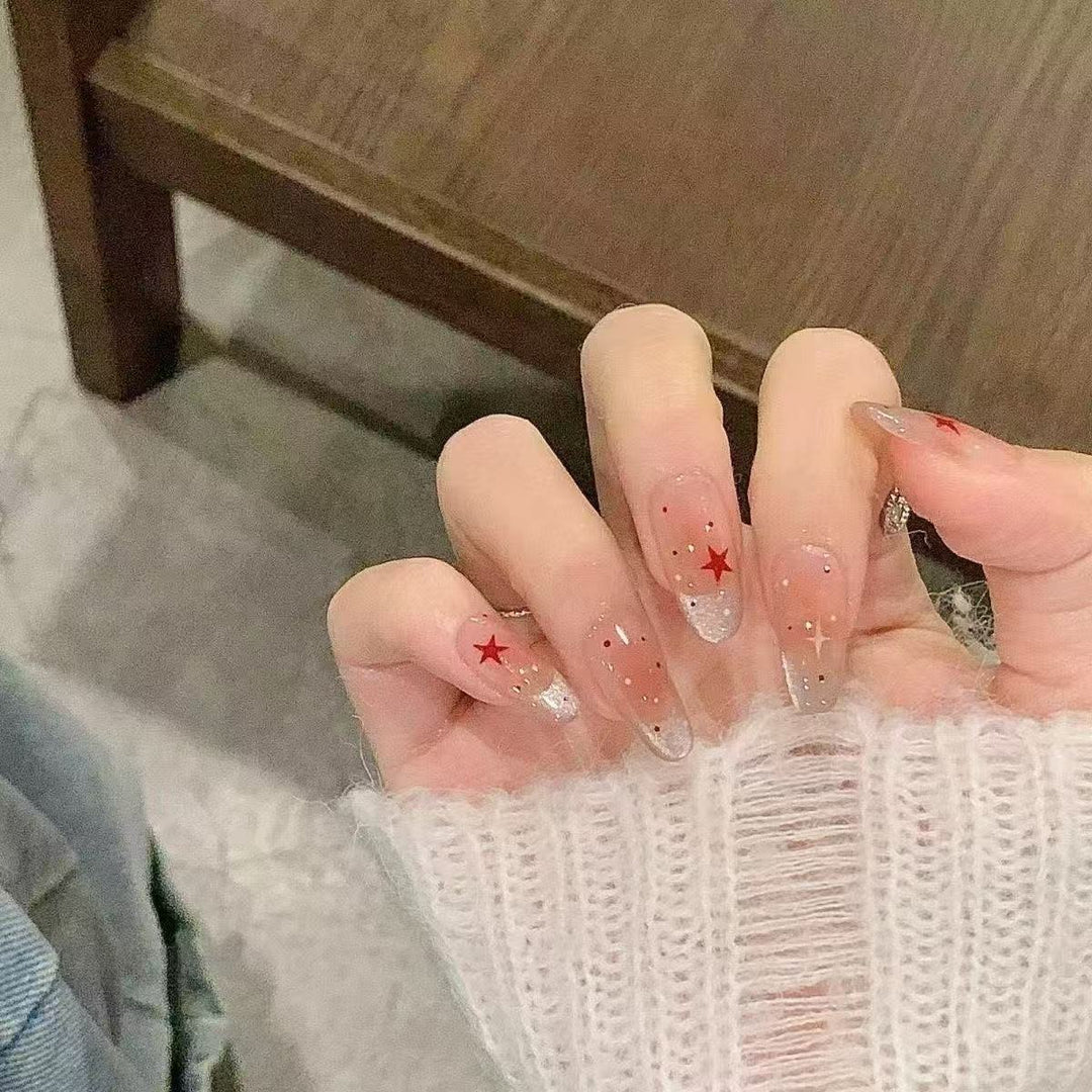 Elegante mit Sternen verzierte Nagelverlängerungen Karnz