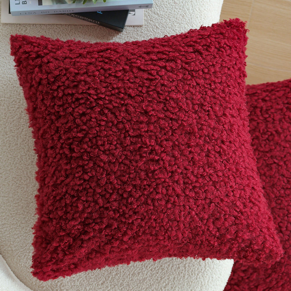 Rechteckiges Dekokissen mit Bouclé-Relief und Quasten Karnz