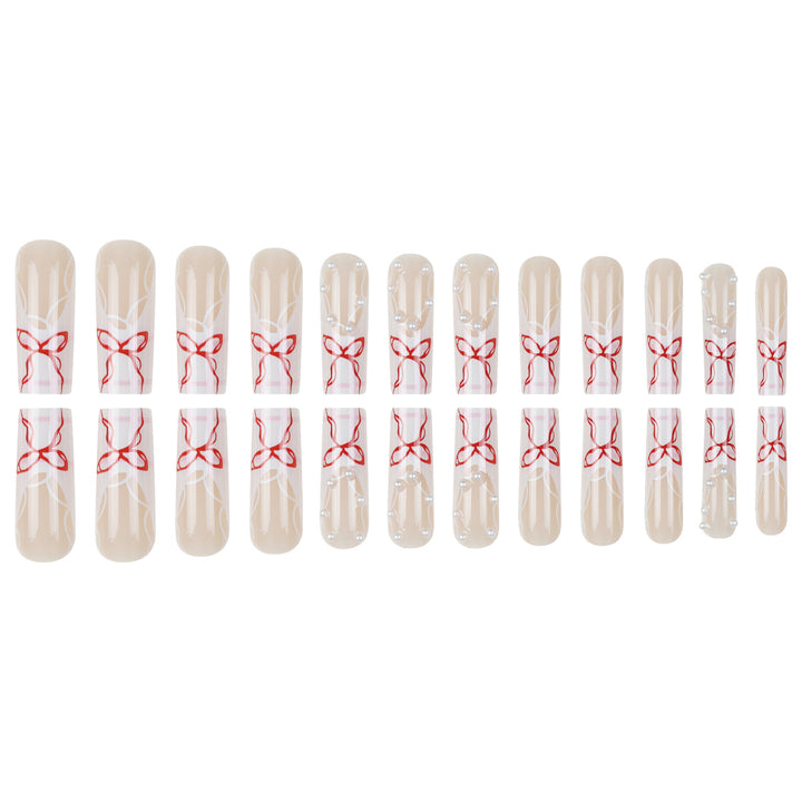 Dekorative Druck-Nagelkunst mit Bandakzenten Karnz