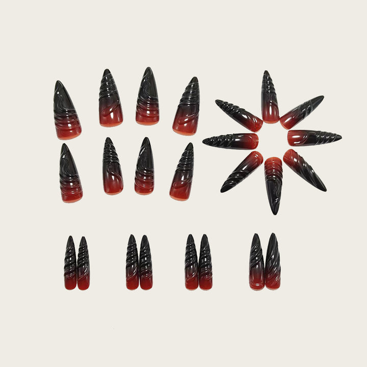 Kunstnägel im Gothic-Stil mit spitzen Enden und glänzender Oberfläche Karnz