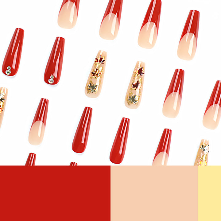 Glamouröse Acryl-Nägel mit Blätter-Design und Glitzerakzenten Karnz