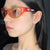 Damen extravagante Sonnenbrille mit geschwungenem Design Karnz