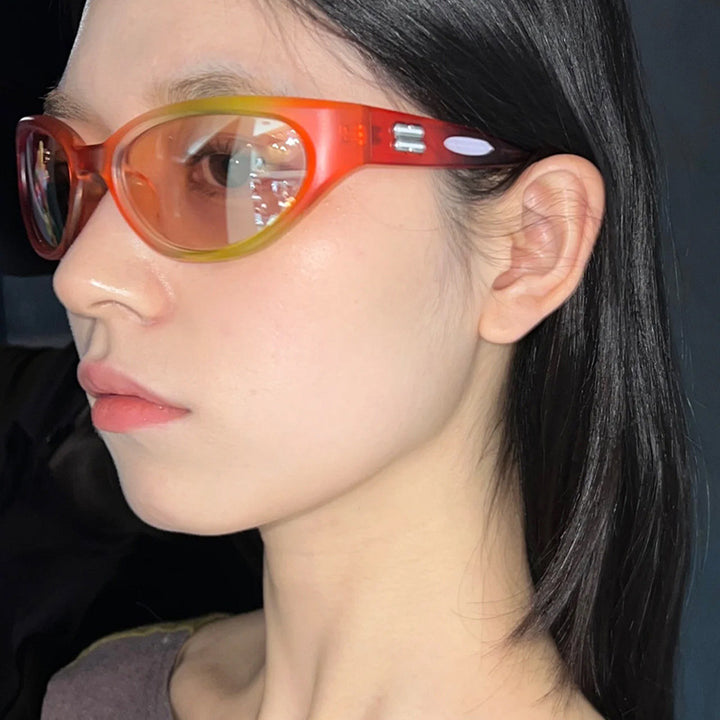 Damen extravagante Sonnenbrille mit geschwungenem Design Karnz