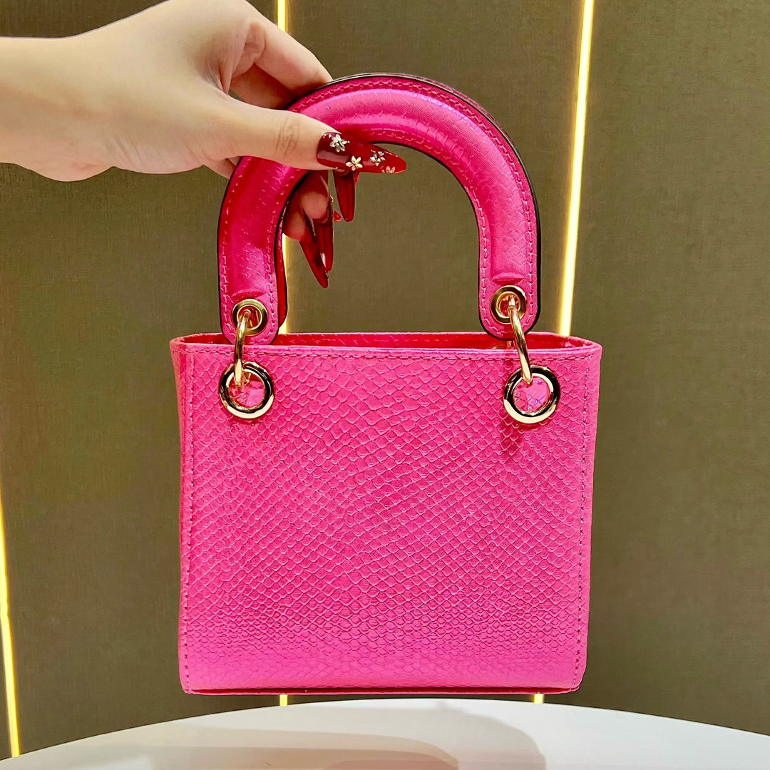 Stylische Schlangenleder-texturierte Handtasche