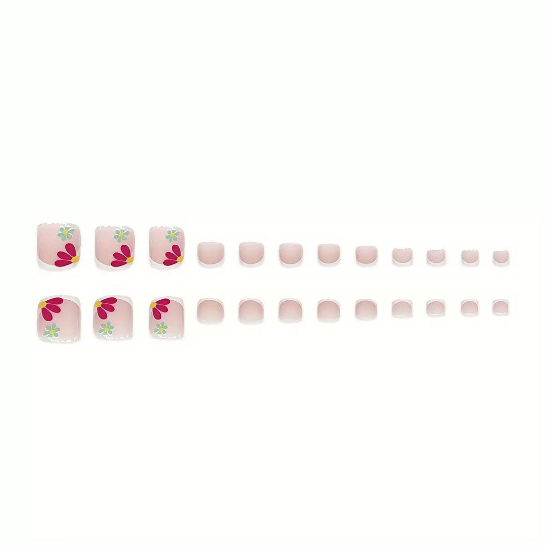 Kunstnagelset mit leuchtenden Blumenmotiven und Glitzerakzenten Karnz