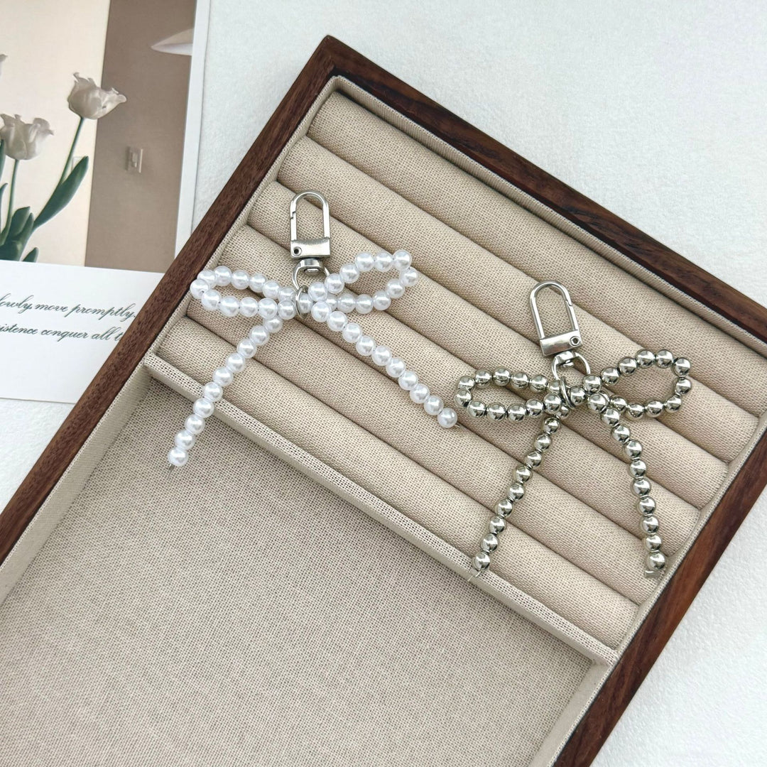 Eleganter Perlenschleifen-Schlüsselanhänger Karnz