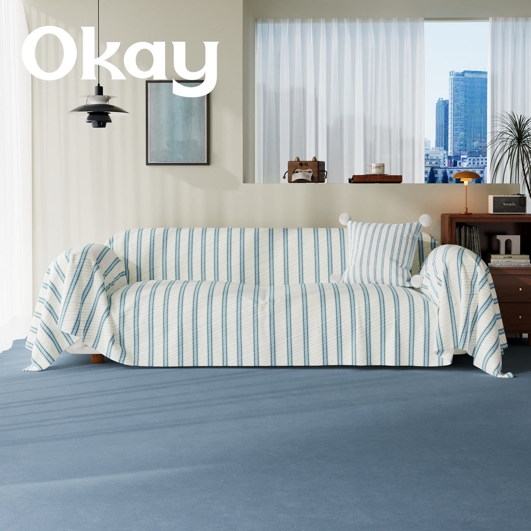 Quilted Striped Reversible Sofa Slipcover with Pom-Pom Accent Pillow