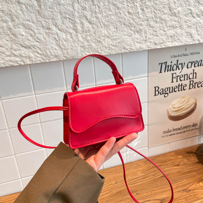 WoElegant Strukturierte Mini-Handtasche Karnz