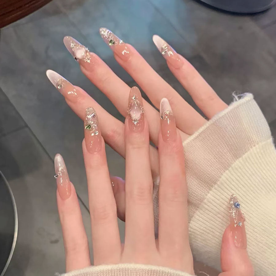 Dekorative Lange Stiletto Press-On Nägel mit Strass-Akzenten