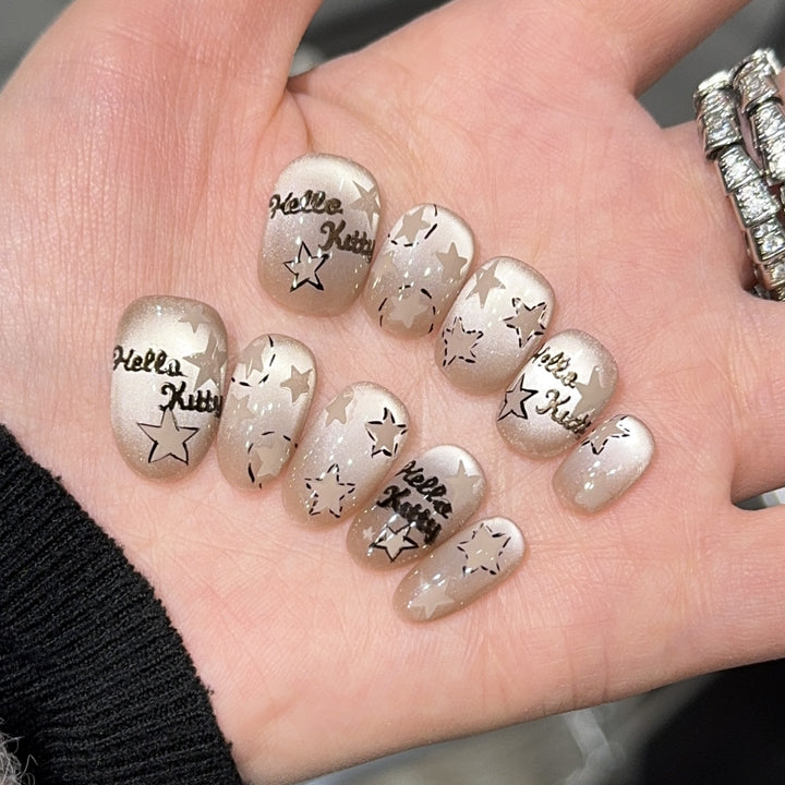 Künstliche Nagelspitzen mit Hello Kitty-Design Karnz
