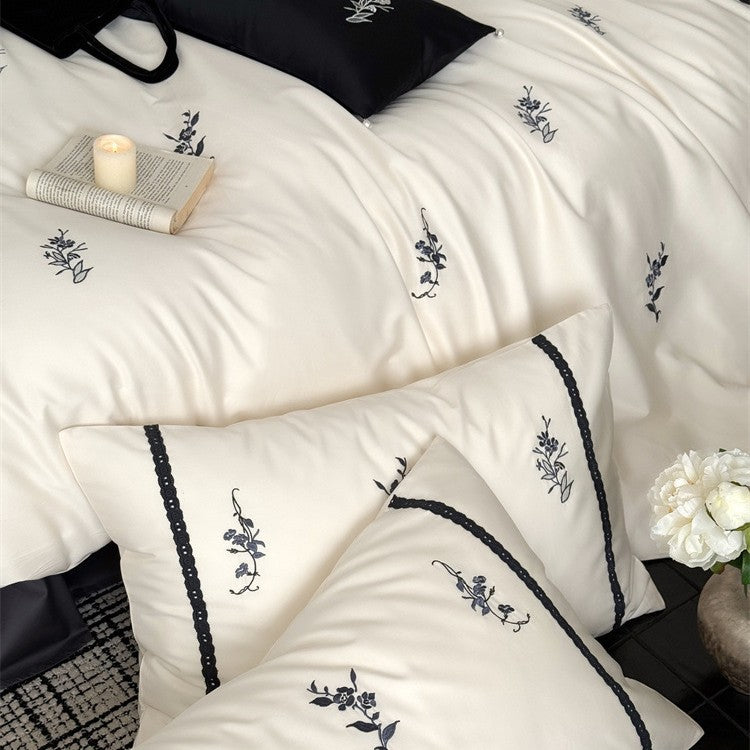 Luxuriöses Satin-Bettwäsche-Set mit feiner Blumenstickerei Karnz
