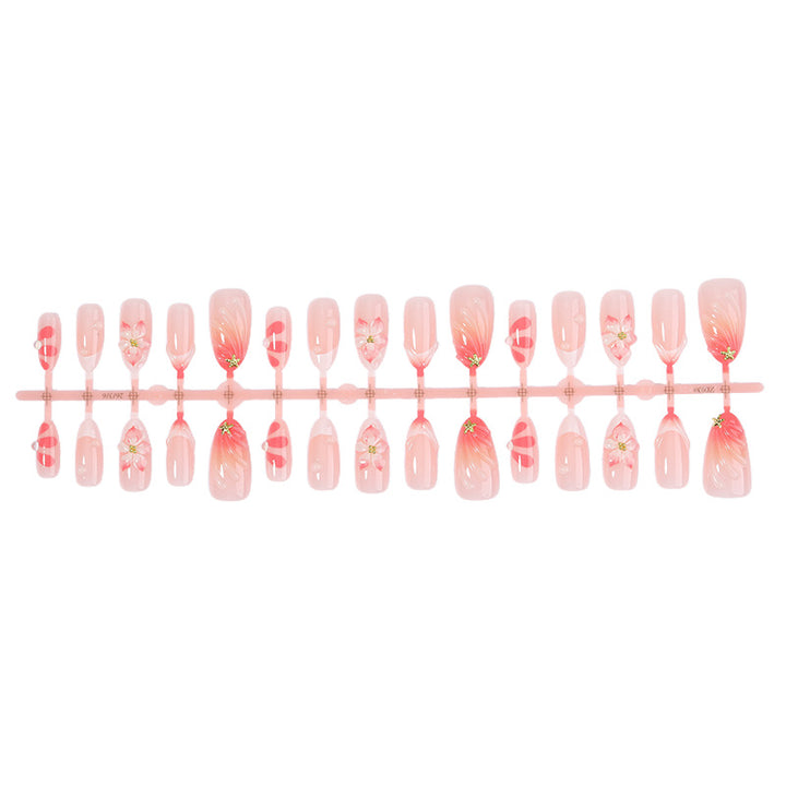 Kunstnagelset mit floralem Design und zartem Farbverlauf Karnz