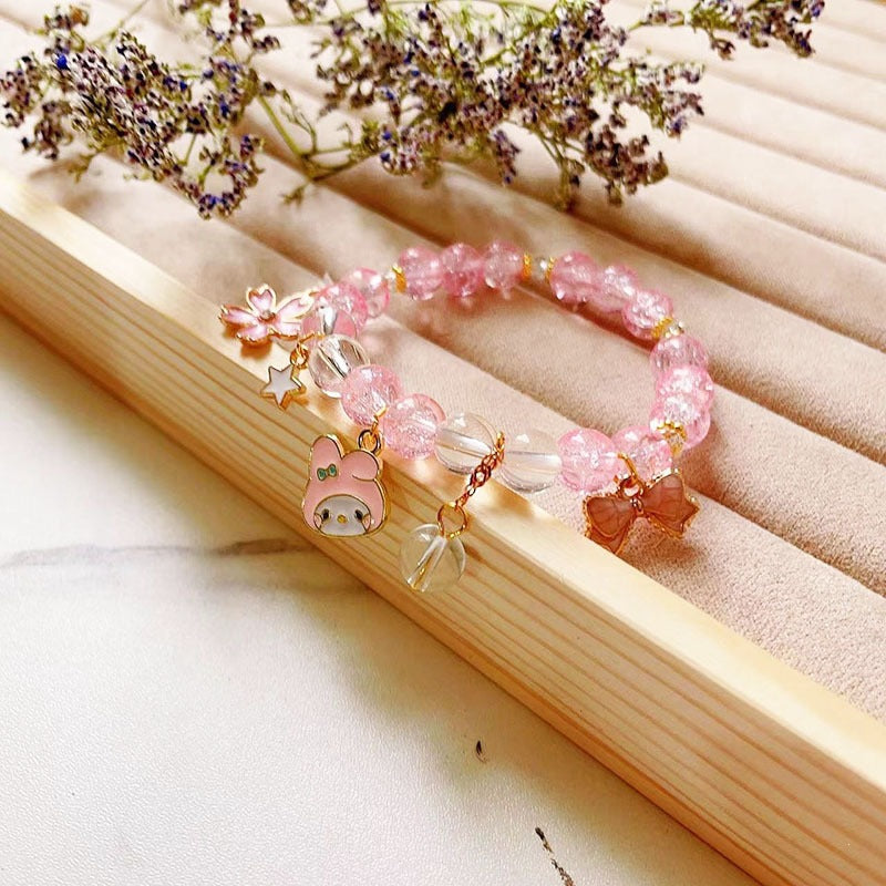 Elegantes Armband mit Tier- und Glitzeranhängern Karnz
