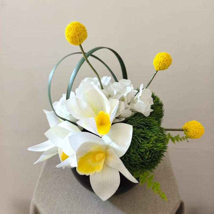 Elegante dekorative Orchideenarrangement