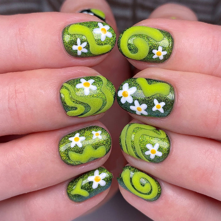 Kunstfingernägel mit Floralen und Glitzernden Akzenten Karnz