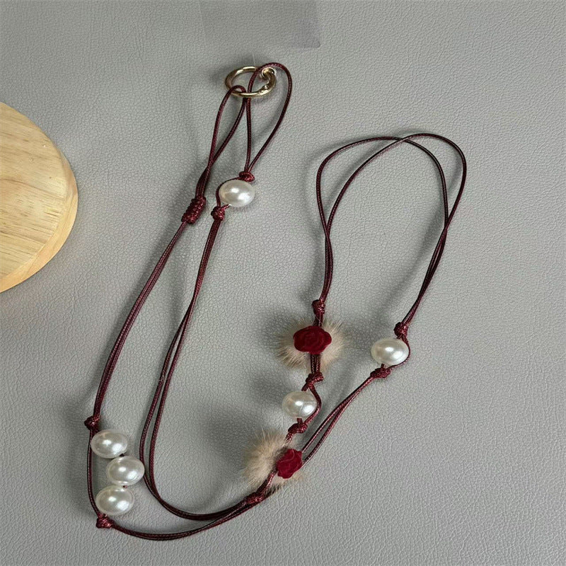 Elegante Perlen Brillenband Karnz