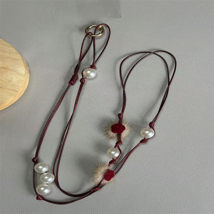 Elegante Perlen Brillenband Karnz