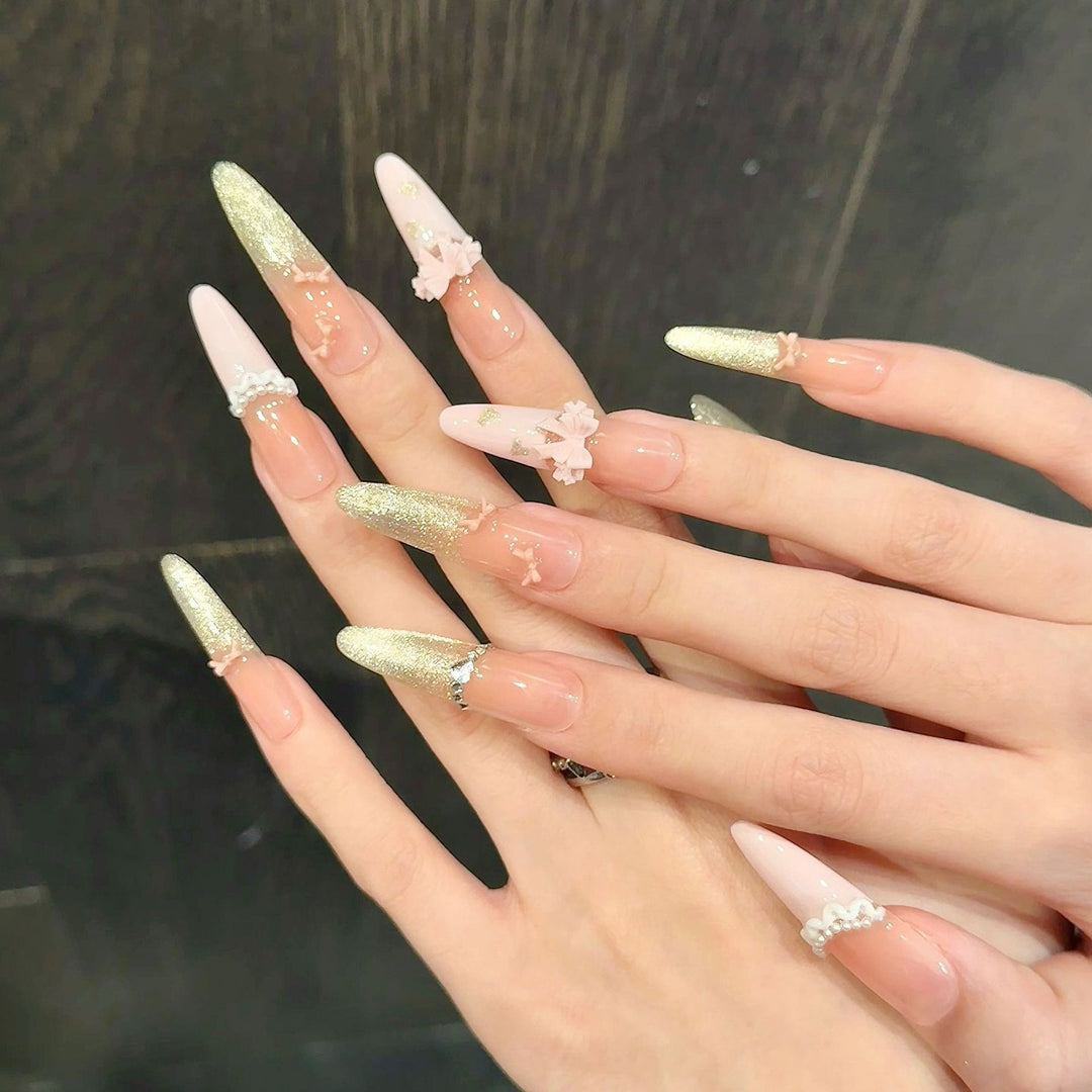 Elegante Stiletto Press-On-Nagelset mit Blumen- und Glitzerelementen