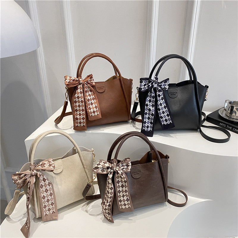 Elegante Schleifenakzent-Handtasche Karnz