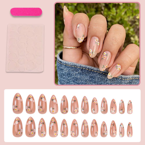 Kunstnagelset mit floralen Designs und natürlichem Look Karnz