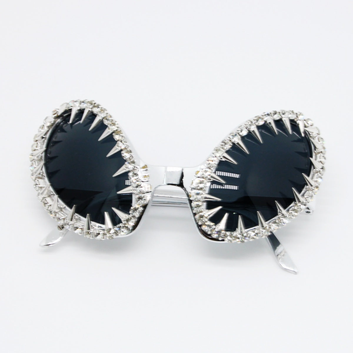 Damen auffällige Sonnenbrille mit luxuriösem Kristallbesatz und spitzen Designelementen Karnz