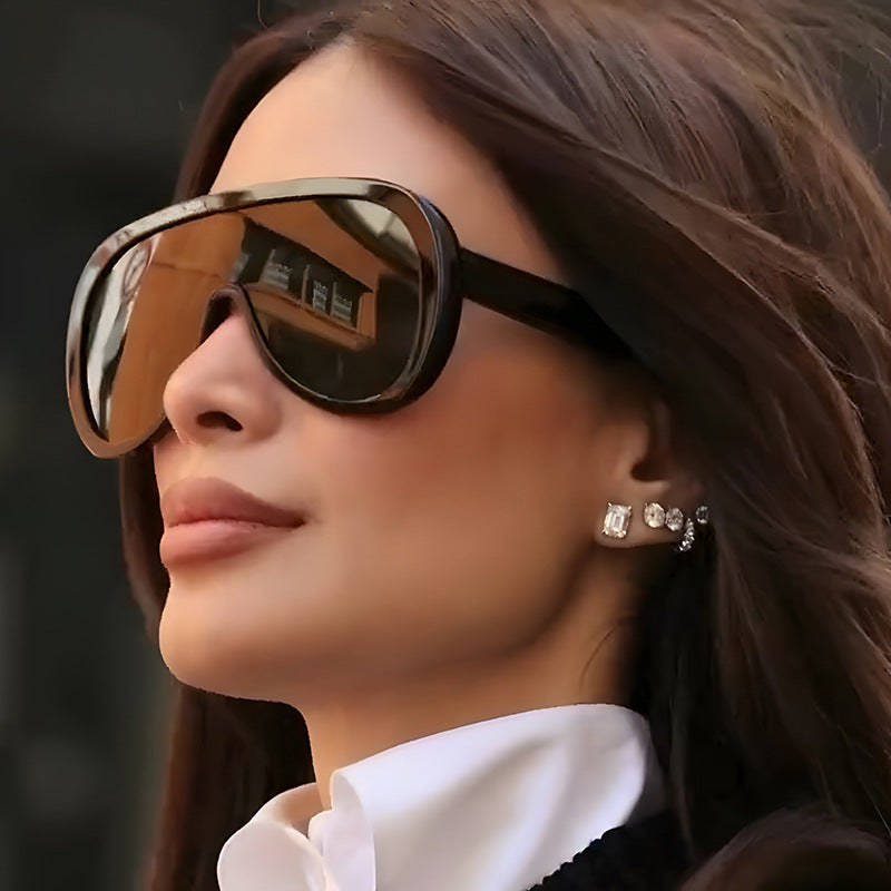 Damen futuristische Sportsonnenbrille mit breiter Sichtscheibe und UV-Schutz Karnz
