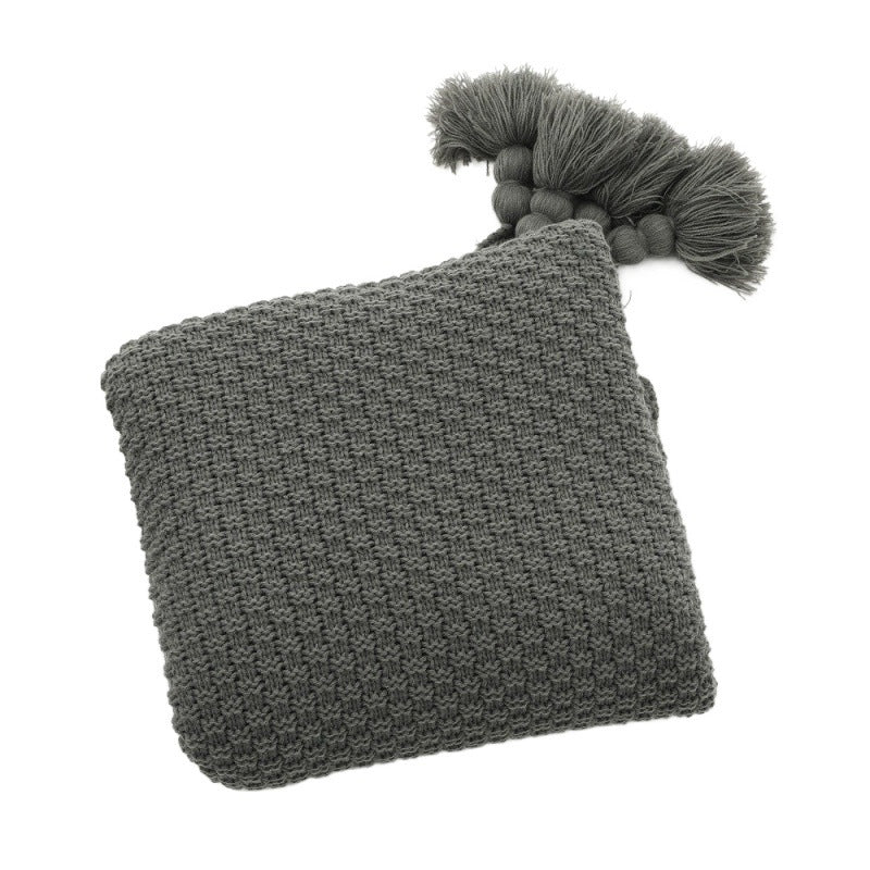 Strukturierte Strickwurfdecke