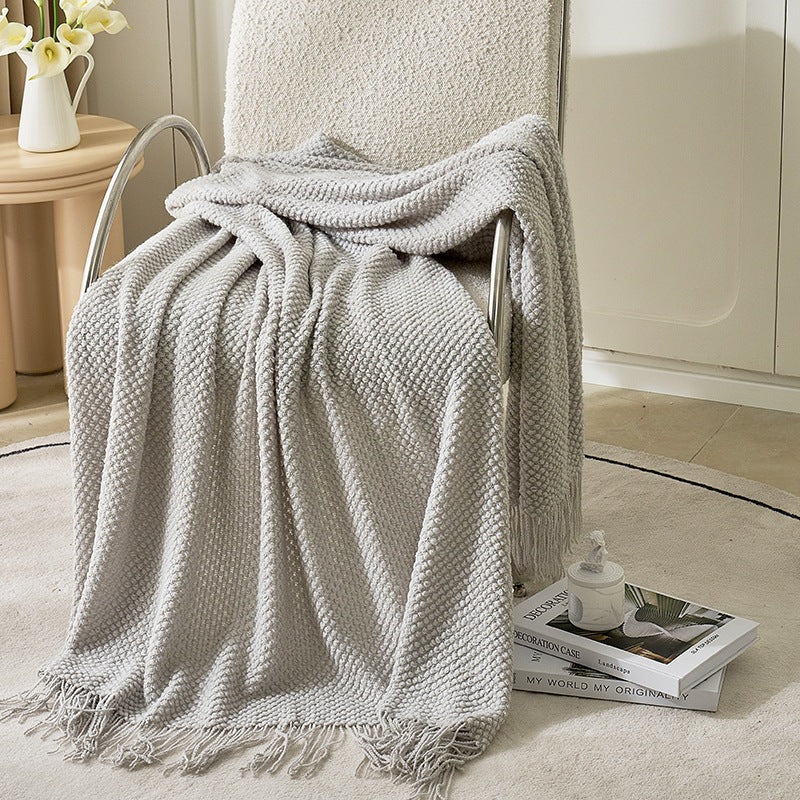 Strukturierte Strickwurfdecke