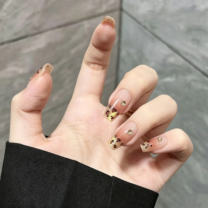 Künstlerisches Ombre Press-On Nagelset mit Glitzerakzenten Karnz