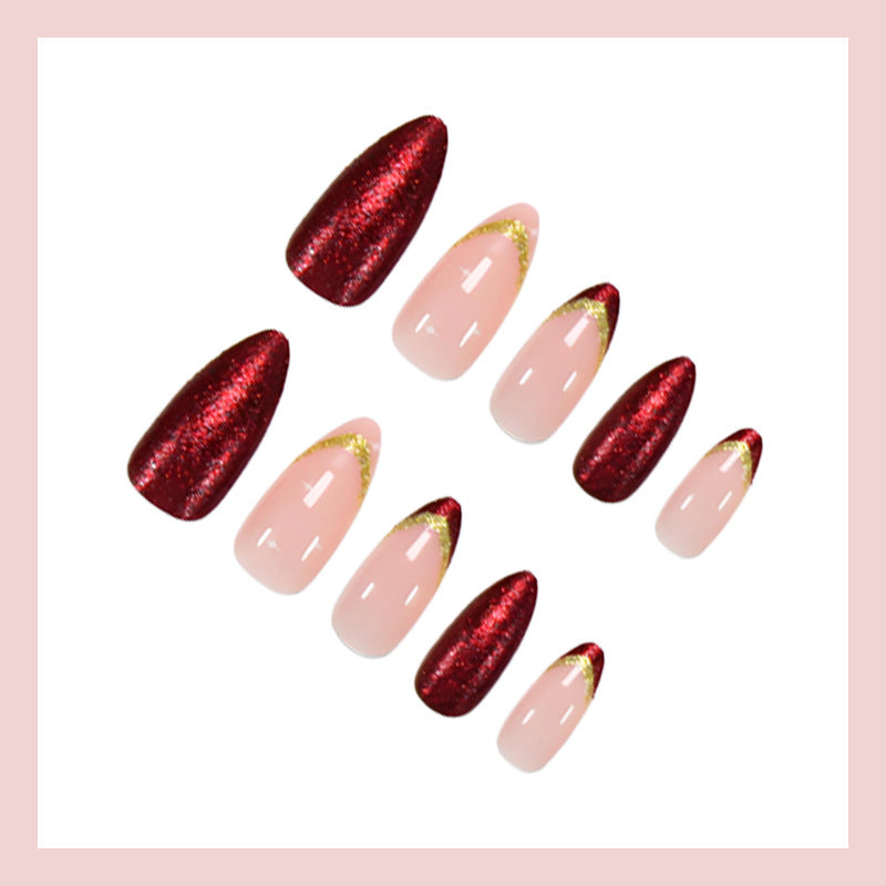 Kunstnagelset mit luxuriösen Glitzerverzierungen und starren Spitzen Karnz