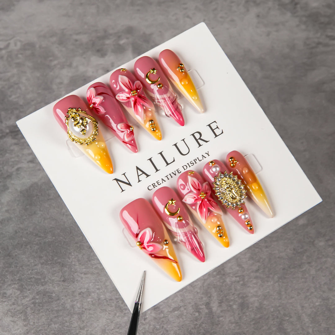 Künstlerisches Stiletto Press-On Nail Set mit floralen und Juwel-Akzenten