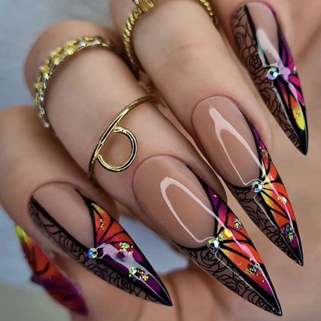Künstlerisches Stiletto Press-On Nagelset mit floralem und abstraktem Design