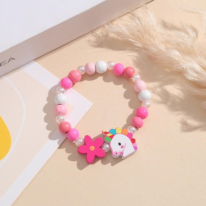 Verspieltes Kinderarmband mit Einhorn- und Blumenmotiv Karnz