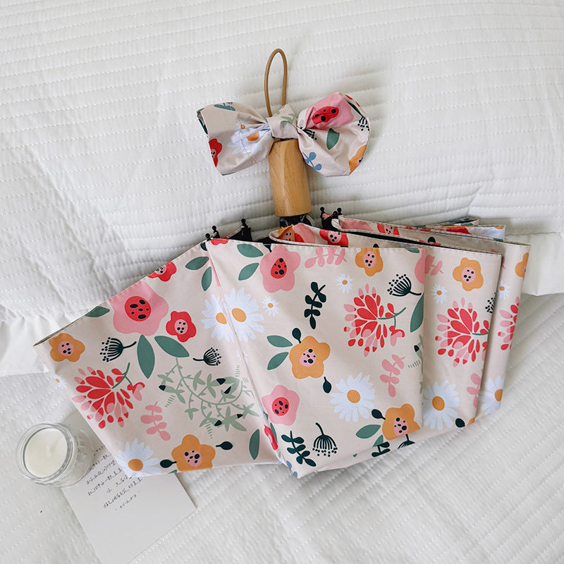 Damen Faltbarer Regenschirm mit floralem Design und niedlichen Details Karnz