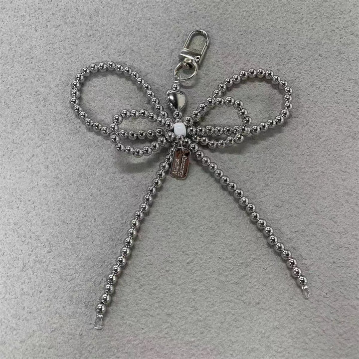 Elegante Perlenbogen Schlüsselanhänger Karnz