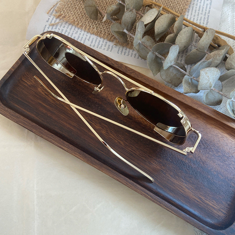 Modische Runde Sonnenbrille mit Feinem Metallrahmen Karnz