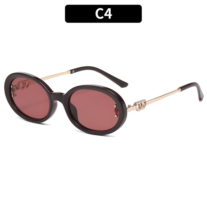 Premium ovale Rahmen-Sonnenbrille mit dekorativen Metallelementen